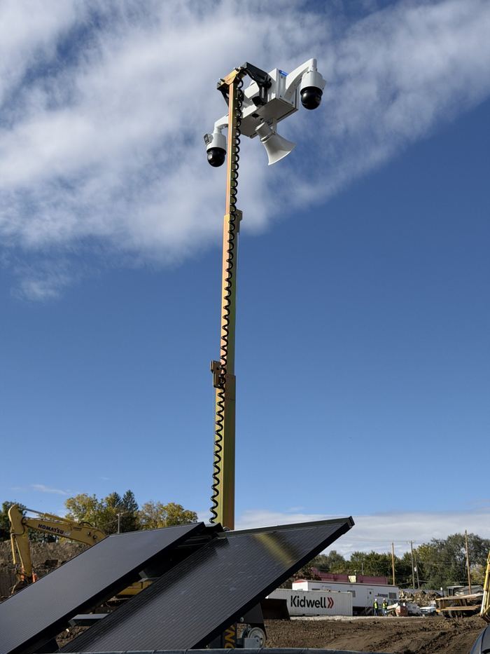 Camera trailer mast at a construction jobsite